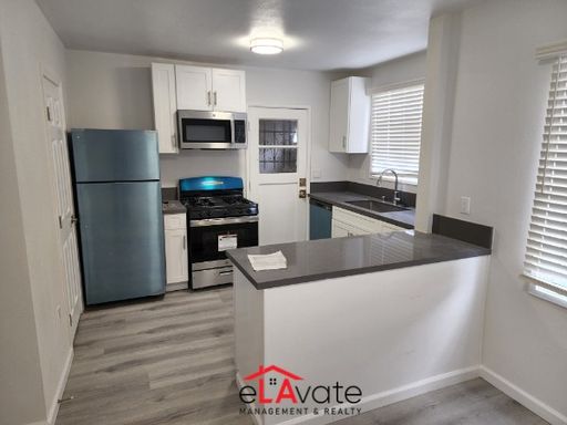 Renovated 1BR Apartment | Stainless Appliances + Laundry – photo 1