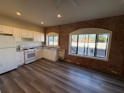 Modern Remodeled Studio w/ Exposed Brick & Natural Light – LA Living – photo 1