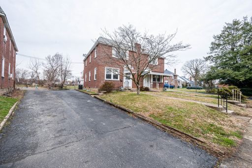 HALF MONTH RENT FREE** Twin Brick Home in Ridley SD! Granite and stainless kitchen! Renovated bathroom! Large rear fenced in yard, central a/c! – photo 1