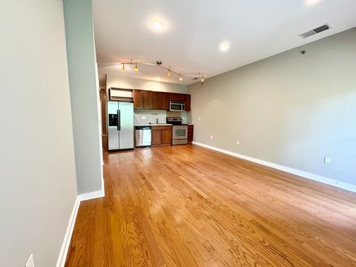 Modern & Spacious 1 Bedroom with In-Unit Laundry, Private Balcony & Gated Parking Access – photo 1