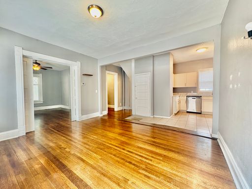 Spacious 2BR with Hardwood Floors, In-Unit Laundry, Garage & Charming Porch – photo 1