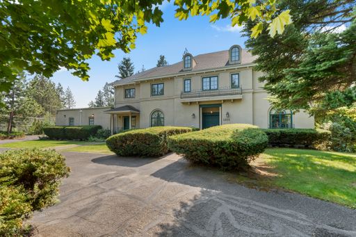 "Experience Luxury Living: Expansive 4-Bedroom Retreat Estate with Scenic Views and Elegant Finishes on Spokane's South Hill with 1.5 Acres of privacy!" – photo 1