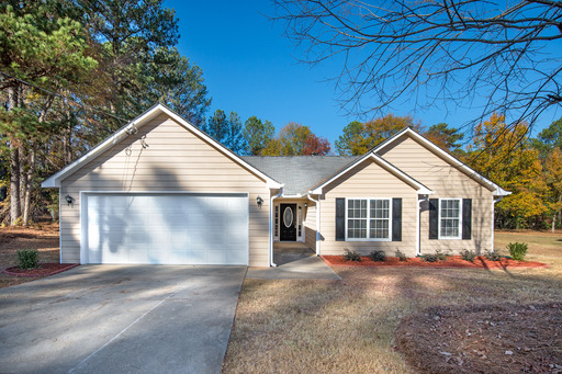 Cute Ranch Beauty in Covington, Fenced Back yard: Granite counter tops – photo 1