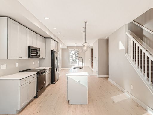 Spacious 4-Bedroom, 3.5-Bath Duplex with Finished Basement & Fenced Yard – photo 1