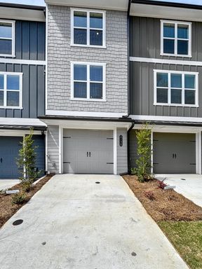 2-Bedroom Townhome with Modern Amenities and Quiet Location / Pet-Friendly / Available Now! – photo 1
