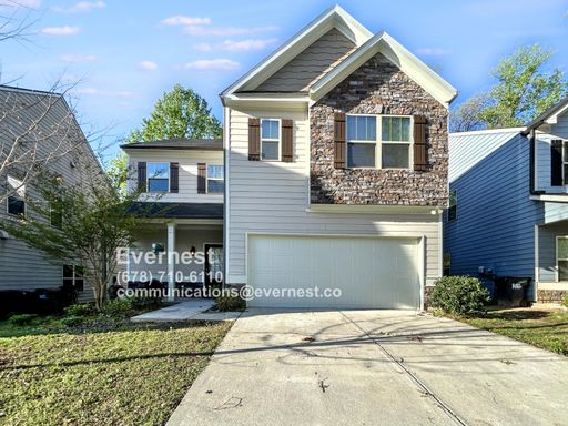 Spacious 4-Bedroom Home with Fireplace and 2-Car Garage / No Pets Allowed / Available Now! – photo 1