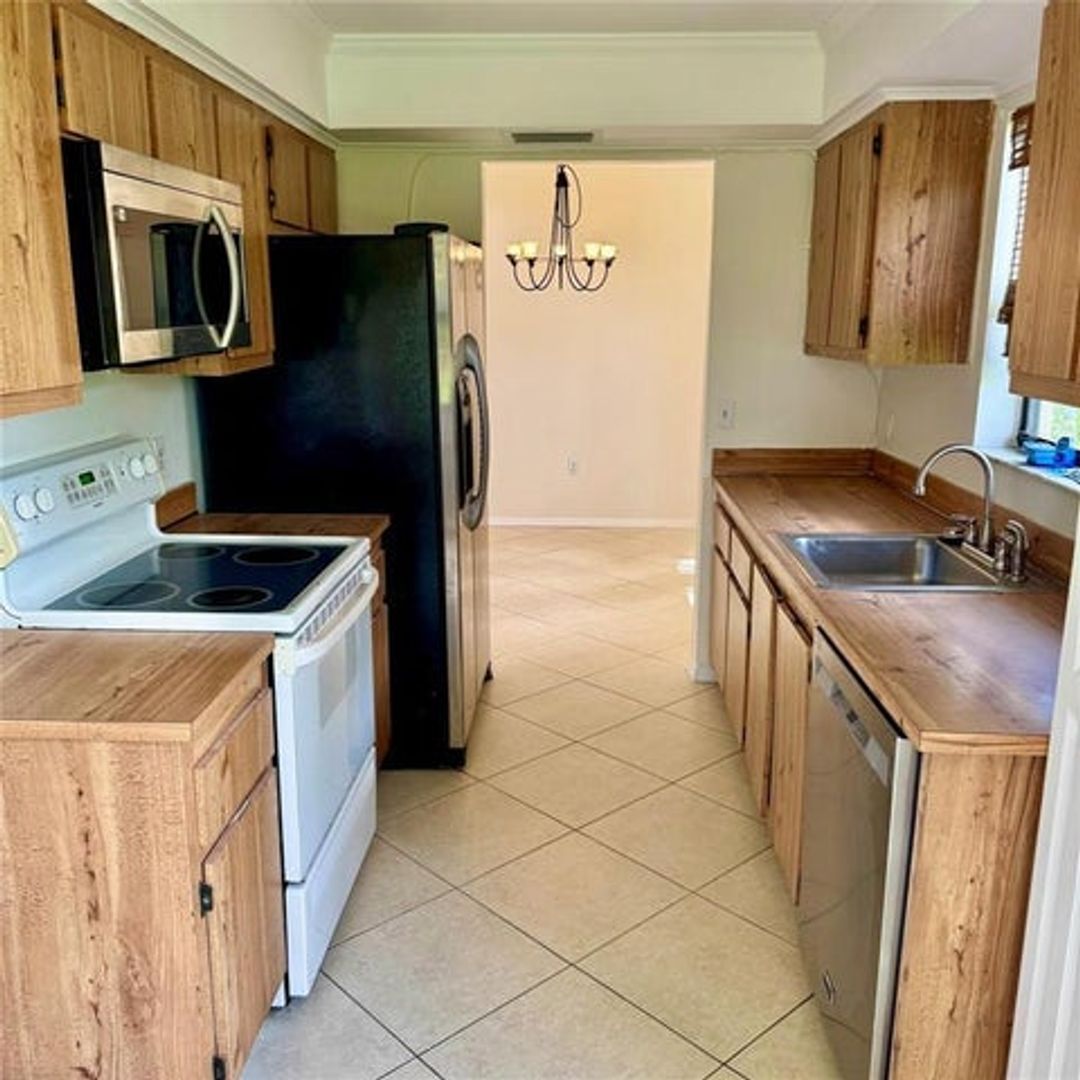 Sunrise House: 10849 NW 30TH Place 371