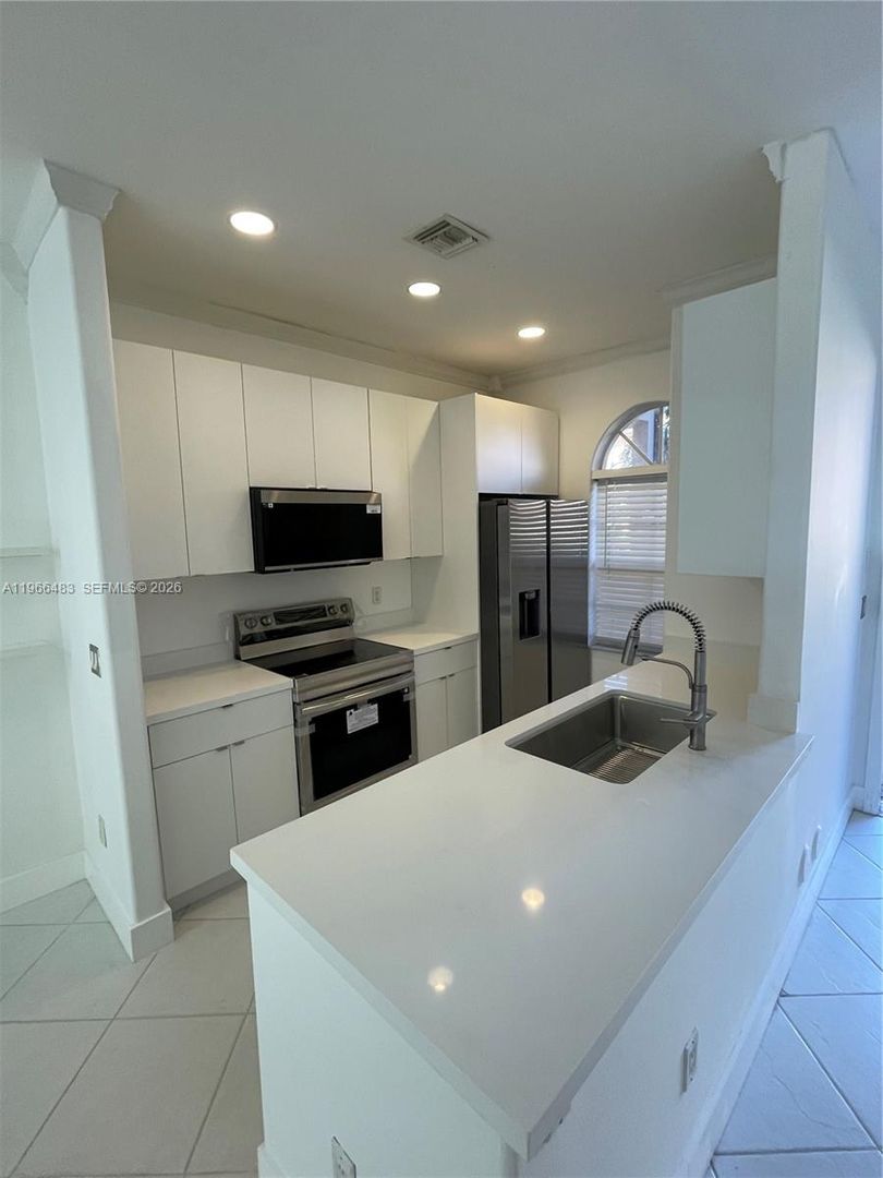 Miami House: 703 NE 195th Street 703
