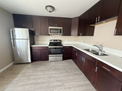 One Month Free Special! Two Bedroom Available Centrally Located With Assigned Parking – photo 1