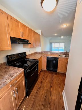 Second Floor Apartment, Archstone, Black Appliances, Floor in Dining and Washer & Dryer – photo 1
