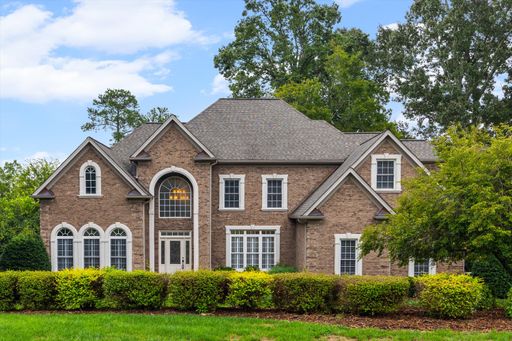 Stunning 4 bed, 4.5 bath Custom home in Carolina Coves of Lake Wylie with a water view!