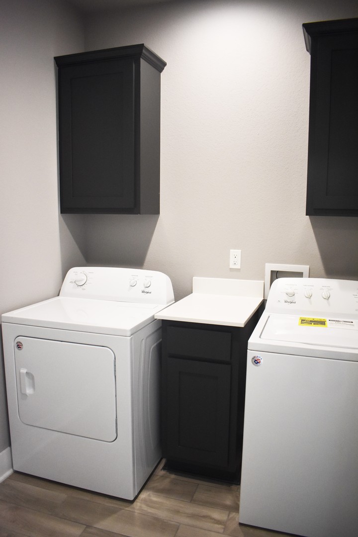 Laundry room at 715 N Salem Rd - Lot 18, The Villas at Forest Hills