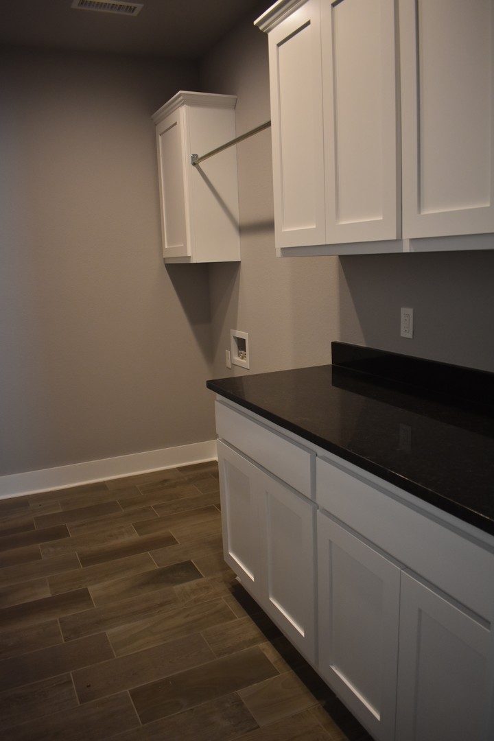 Laundry room at 652 N Malbec Rd - Lot 67, The Villas at Forest Hills