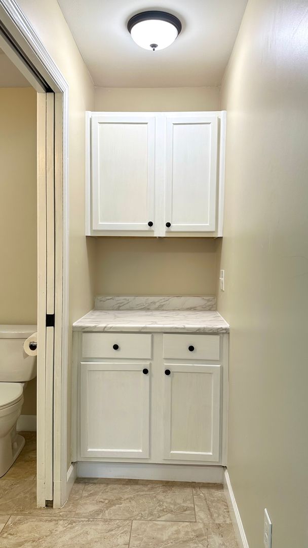 Laundry room at Charming Brand New 2 Bedroom 1 Bath Duplex (1 of 2)
