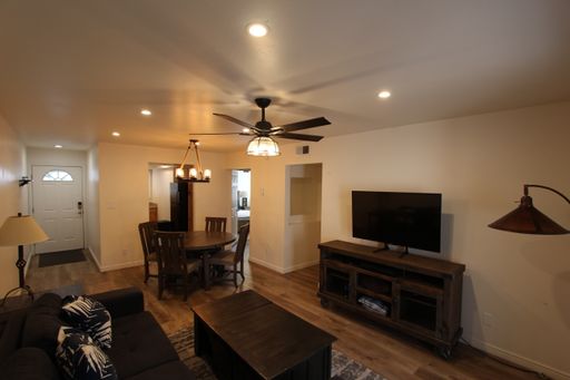 Price Improvement & $300 Move-In Special | Furnished Ground-Floor Condo with Small Fenced Yard – photo 1