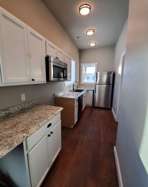 Basement apartment with RV parking and Extra Large Outbuilding for Storage!