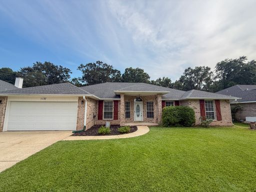4 Bedroom 3 Bath House in Cantonment with a Pool & Solar Panels!