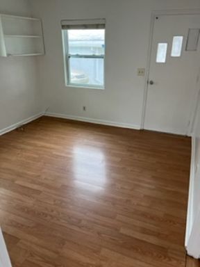 One bedroom one bathroom wood floors and modern bathroom Brand New AC Units and fresh white paint- Very Clean. . Water and Trash Included. Plenty room for parking.
