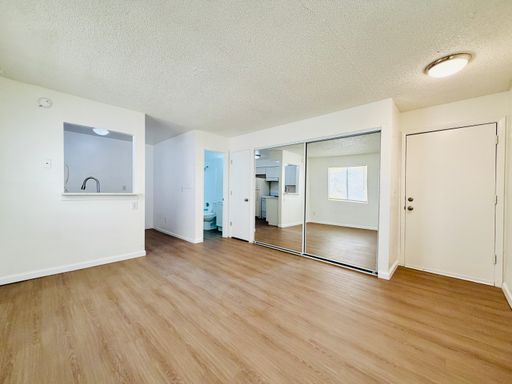 1 Month Free! Studio on First Floor with New Flooring! Community Pool and Gated Community! – photo 1