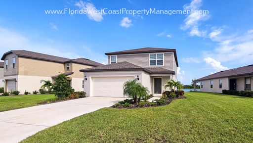 OUTSTANDING LARGE 4 BEDROOM/ 3 BATH HOME IN ISLES AT BAYVIEW! LARGE FLEX SPACE PLUS LAKEIVEWS!