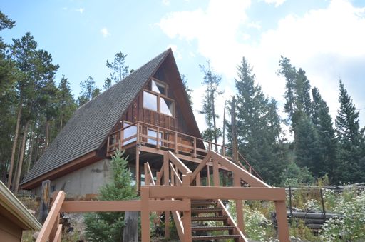 Garden level one bedroom apartment in the hills above BRECK. Pets OK! Includes HEAT and electric! One Car Space in the Garage!