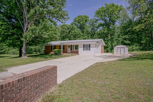 Charming 3-Bed / 1.5-Bath Ranch Home with large Yard & Off-Street Parking – Near White Oak Crossing – photo 1