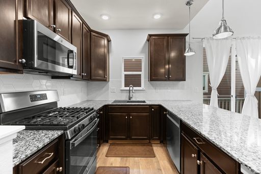Light-Filled 4-Bd/4.5-Bath Townhome in Desirable Englewood! Available NOW! – photo 1