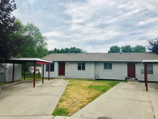 Beautiful single level town home with carport, extra parking and central air.