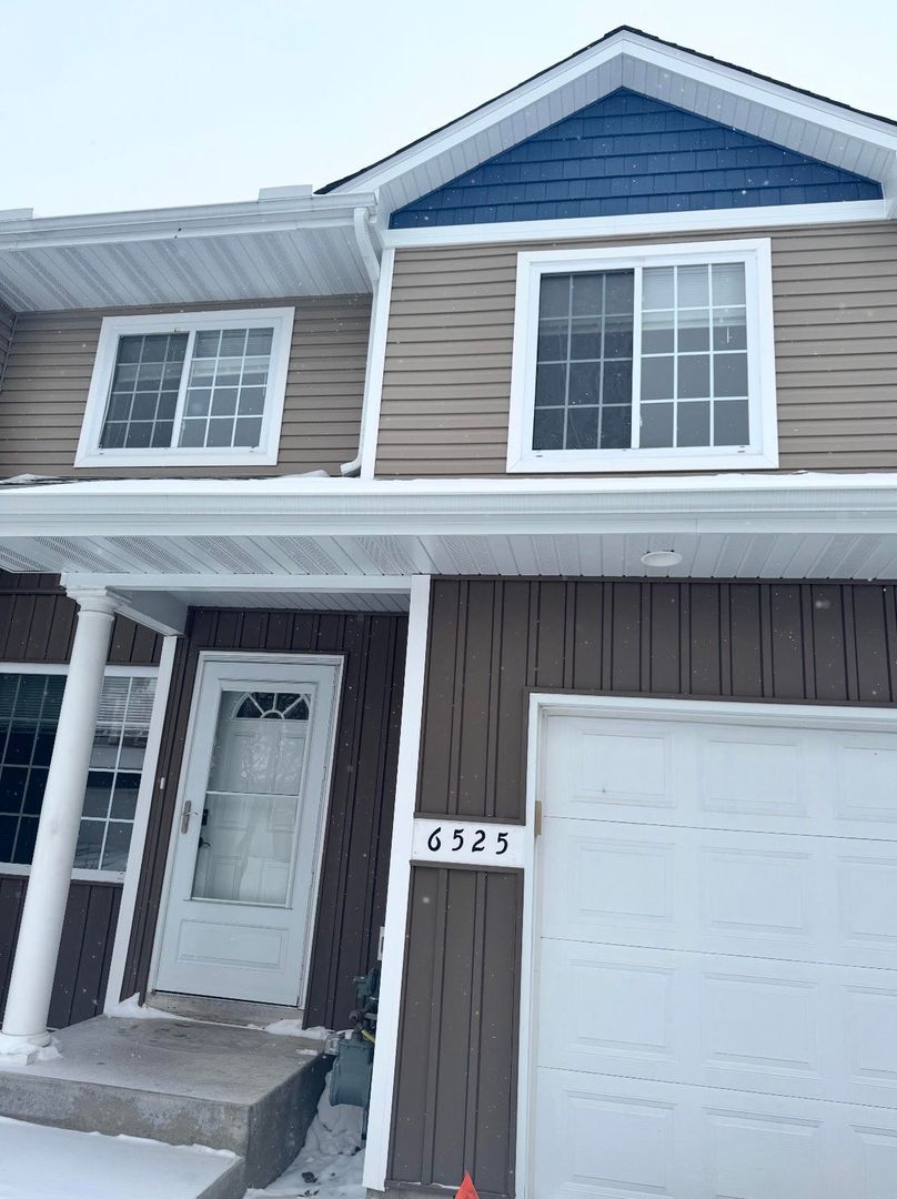 Forest Lake Townhome: 6525 Appaloosa Ave. N.