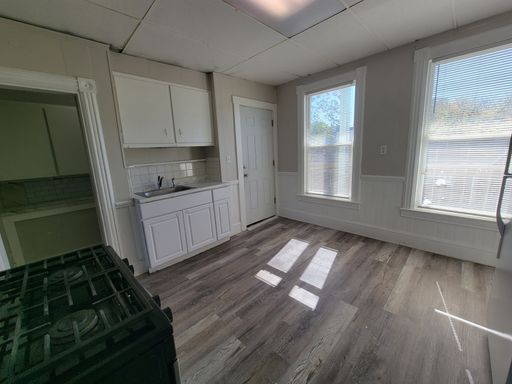 3 bed 1 bath 2nd floor apartment with deck, 3 season room, and large storage room – photo 1