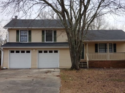 **ASK HOW YOU CAN MOVE IN WITH NO SECURITY DEPOSIT** 65 Stokes Dr: Great home in Stockbridge. Newer (2024) Garage Doors, Kitchen Counter Tops, Paint, & Flooring AVAILABLE SEPT 2026! – photo 1