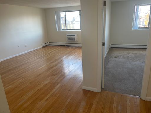 No Fee Massive 2 bed with New floors, kitchen and paint, AC VERY SUNNY!! PARKING INCLUDED