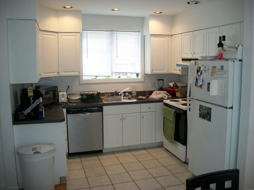 Large Townhouse in Allston, Parking Included, Laundry is in the Unit, Central Heat/AC, Deck – photo 1