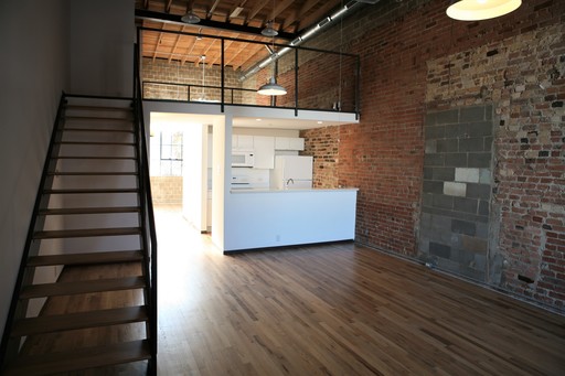 Corner Loft Unit w/ Beautiful Brick and Hardwood Floors – photo 1