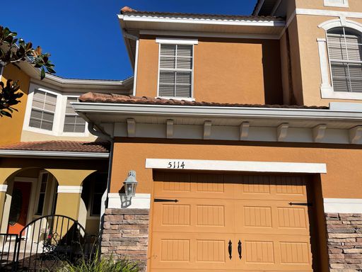 5114 Fiorella Luxurious townhome located within Terracina at Lake Forest – photo 1