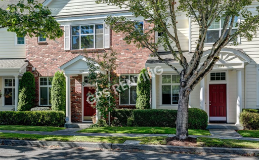 A Rare Gem: Distinctive Unique two-story 2-bedroom, 2.5-bathroom layout with dual primary suites and an upper-level den in a Prime Location – photo 1