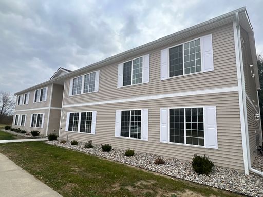 Available Now! Summerfield Condos! Kearsley School District! – photo 1