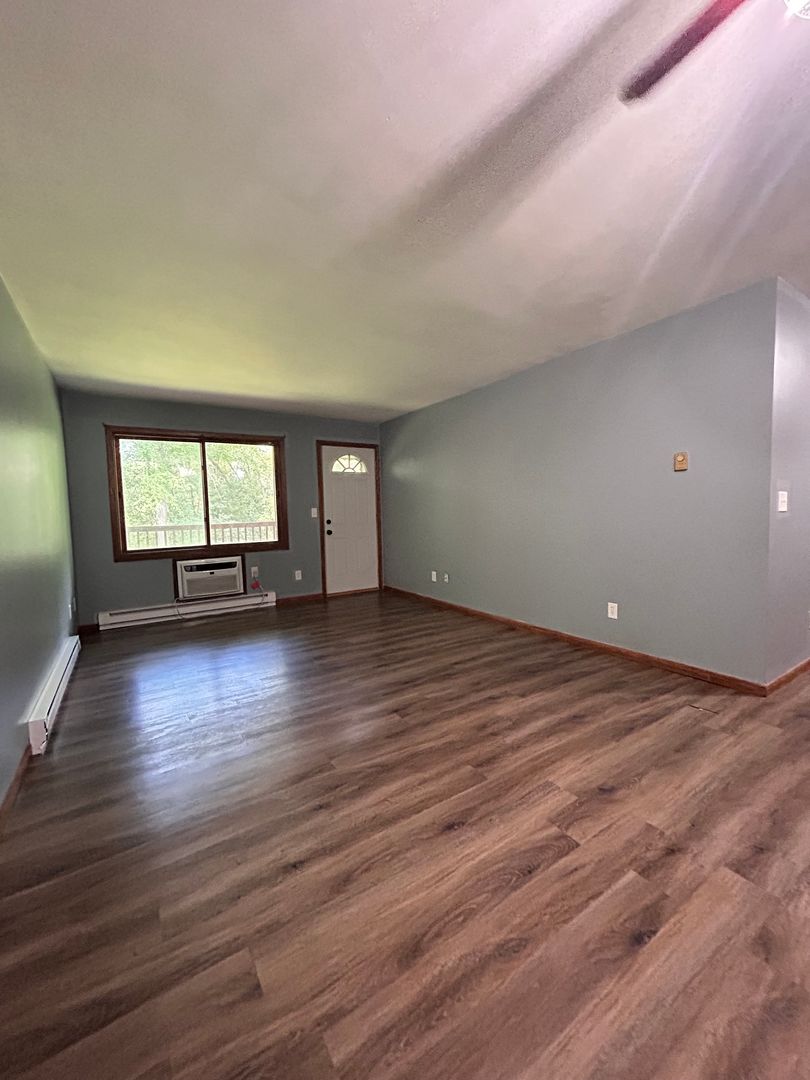 Elk Mound Apartment: 220 S Holly Ave