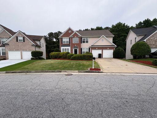 Welcome home to this beautifully refreshed 4-bedroom, 2.5-bath home on a full unfinished basement – photo 1
