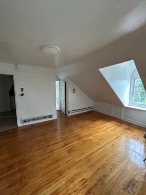 2-bedroom with refinished hardwood under dormer windows – photo 1