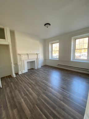 1-bedroom with an original fireplace mantel – photo 1