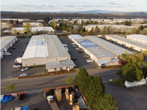 FOR LEASE: Industrial Warehouse with Office, Mezzanine & Private Restrooms 7,289 RSF | NE Portland – Minutes from I-205 & I-84 – photo 1