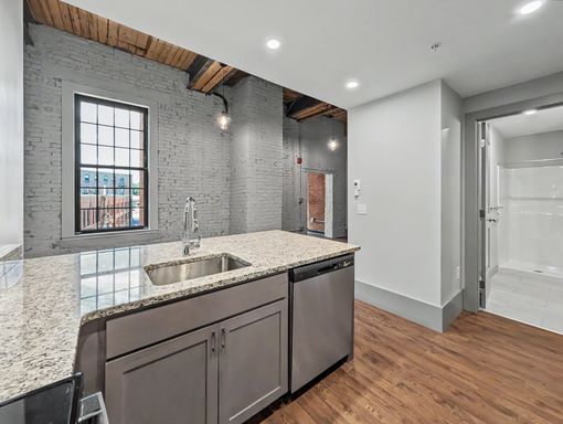 1-Bedroom With Brick Walls – photo 1
