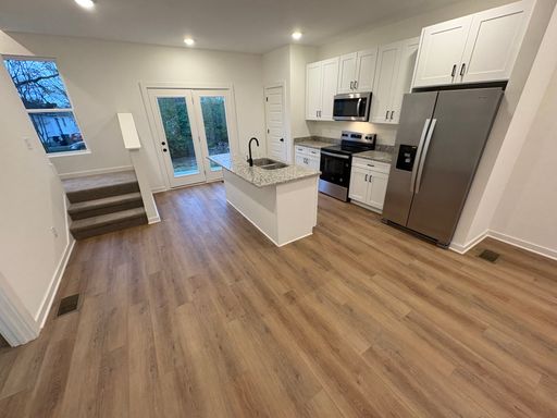 FOR LEASE- NEW BUILD TOWNHOME WITH ROOFTOP! – photo 1
