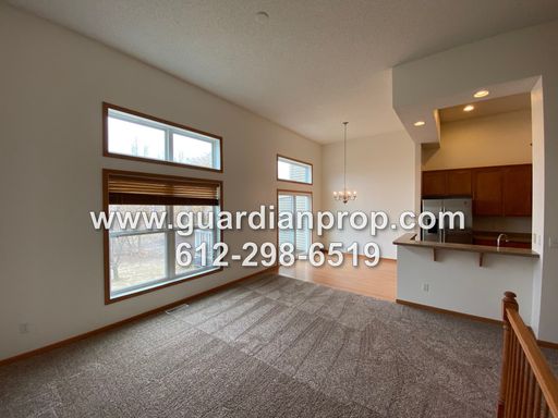 Townhouse Available October 1, High Ceilings, Open Floor Plan, Lower Family Room w/Fireplace, Balcony
