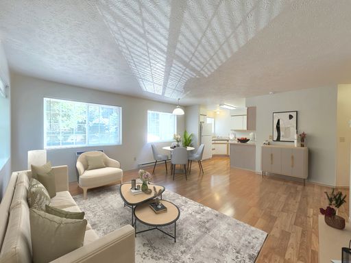 $1,300 - 2 Bed / 2 Bath Lower South Hill Unit with Garage Parking in Secure Building – photo 1