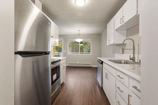1 Month Free, a FREE new 65" TV, plus $250 additional credit if you apply within 24 Hours of Tour! - Luxury Living in Edmonds: Stylish 1-Bedroom with Quartz Counters and Parking