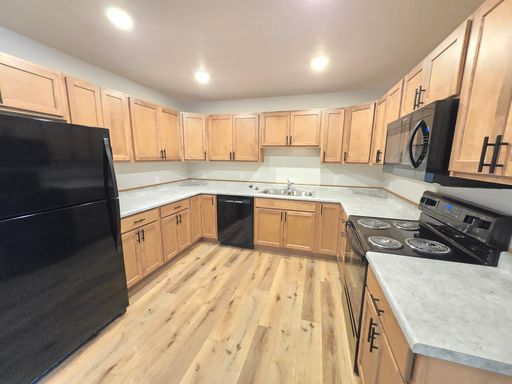 Roomy 2 Bed with Abundant Kitchen Storage & Private Patio – Attached Garage & Utilities Included! – photo 1