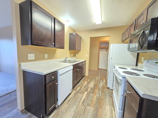 Spacious & Updated 2 Bed 1 Bath with Private Deck and most utilities included in East Sioux Falls! – photo 1