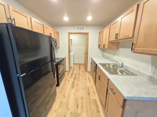 Roomy 2 Bed with Pantry, Private Patio & Ample Storage – Garage & Utilities Included! – photo 1